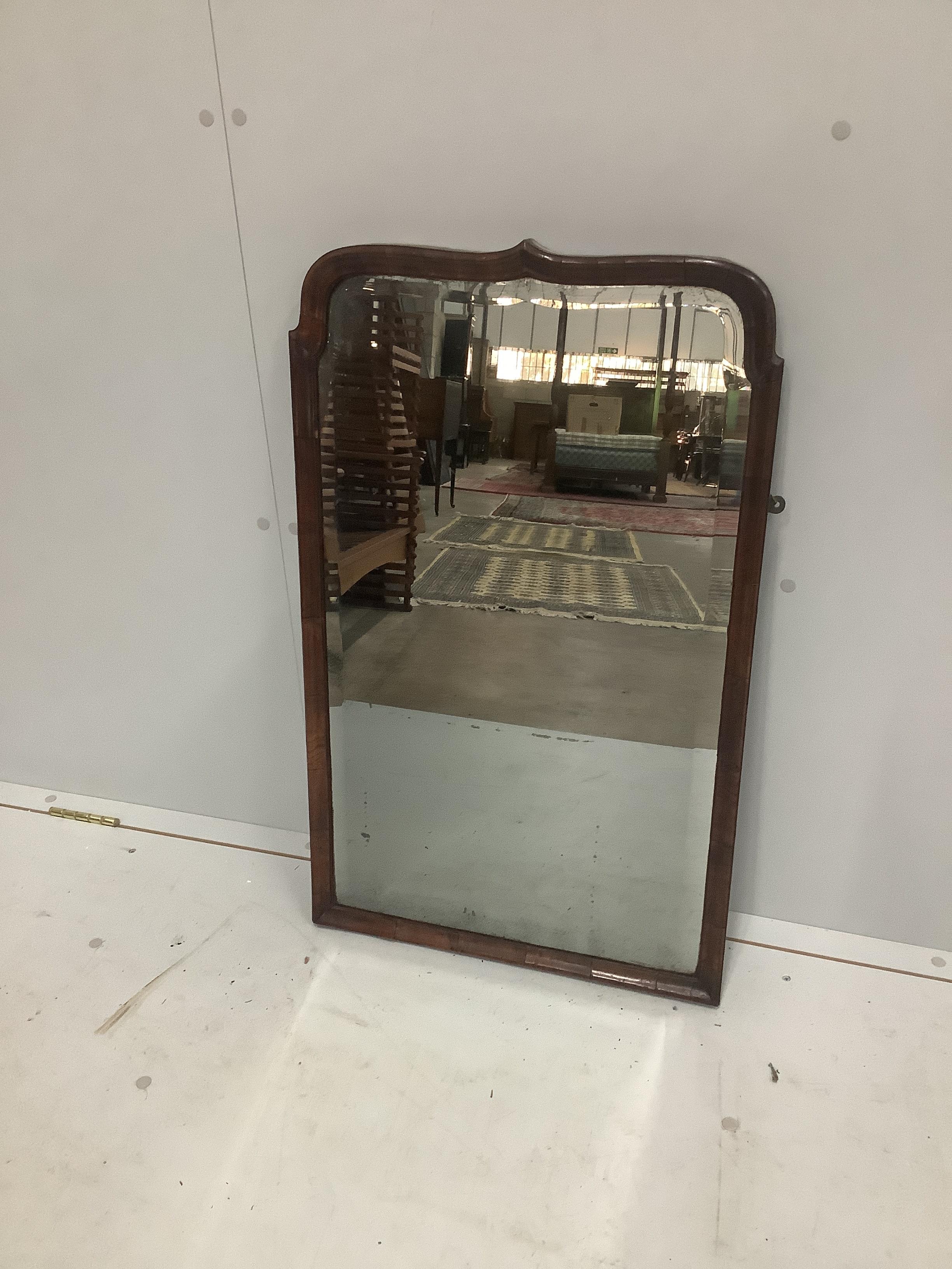 An early 18th century walnut bevelled wall mirror, width 81cm, height 50cm